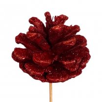 Dennenappel rood met glitters op een stok